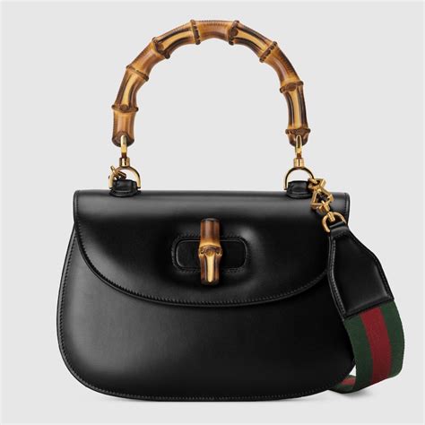 borsa gucci tela e catena bamboo|Collezione Gucci Bamboo 1947 .